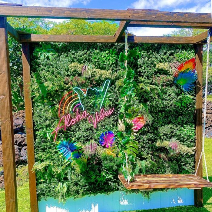 Aloha Vibes Neon Sign with Foilage Wall